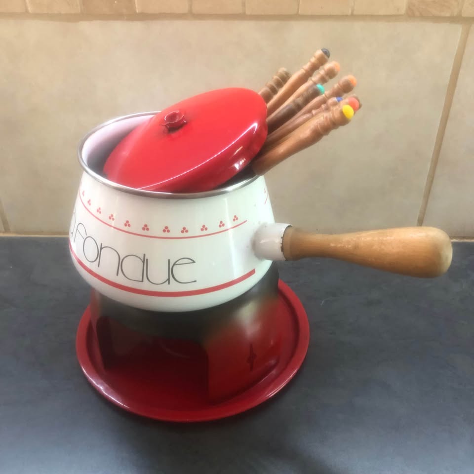 2 Cheese Fondue sets. Used but good condition. Collect Mayberry Park.