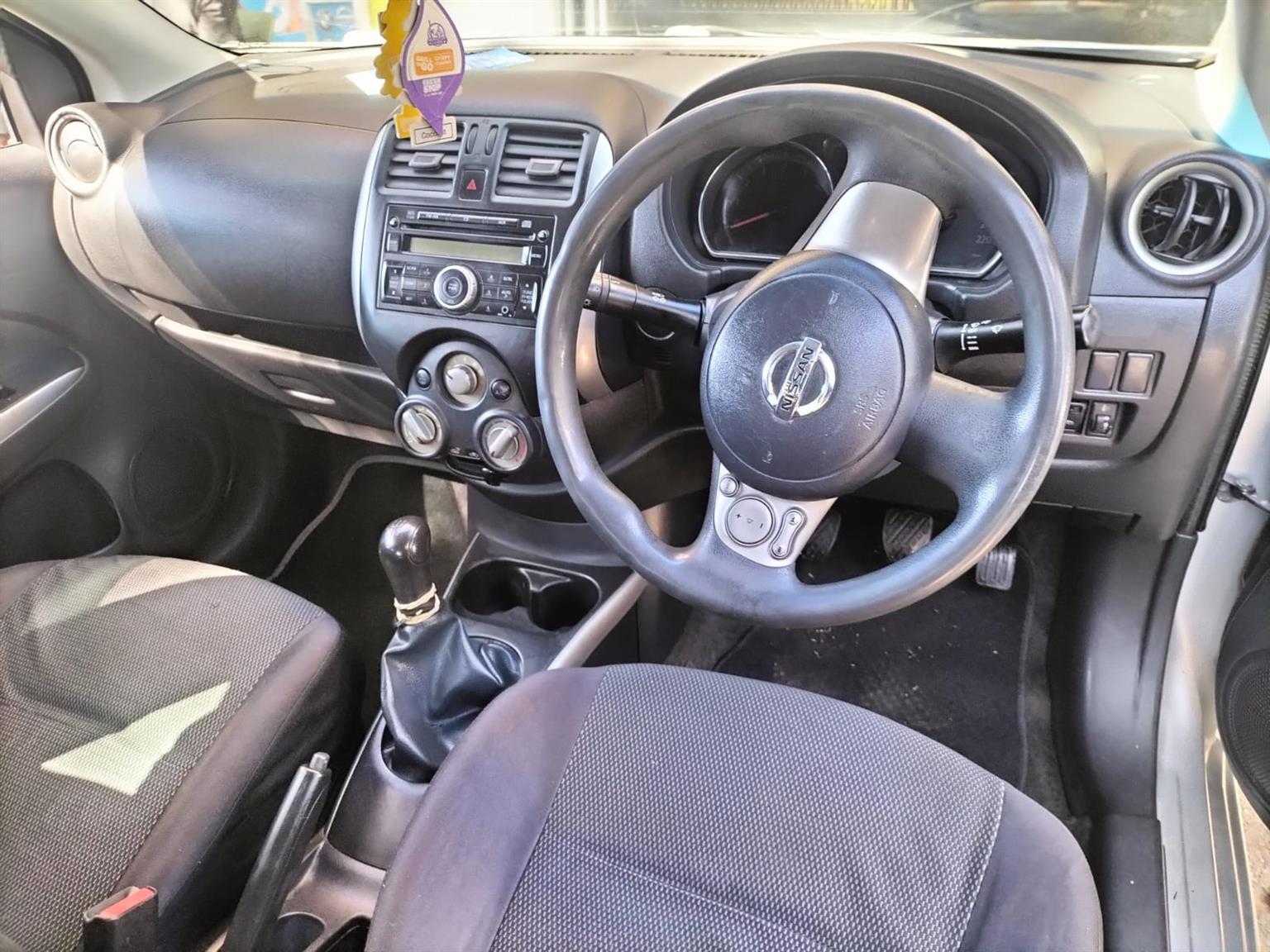 2015 Silver Nissan Almera sedan 1.5 Manual milage 86,000 km petrol