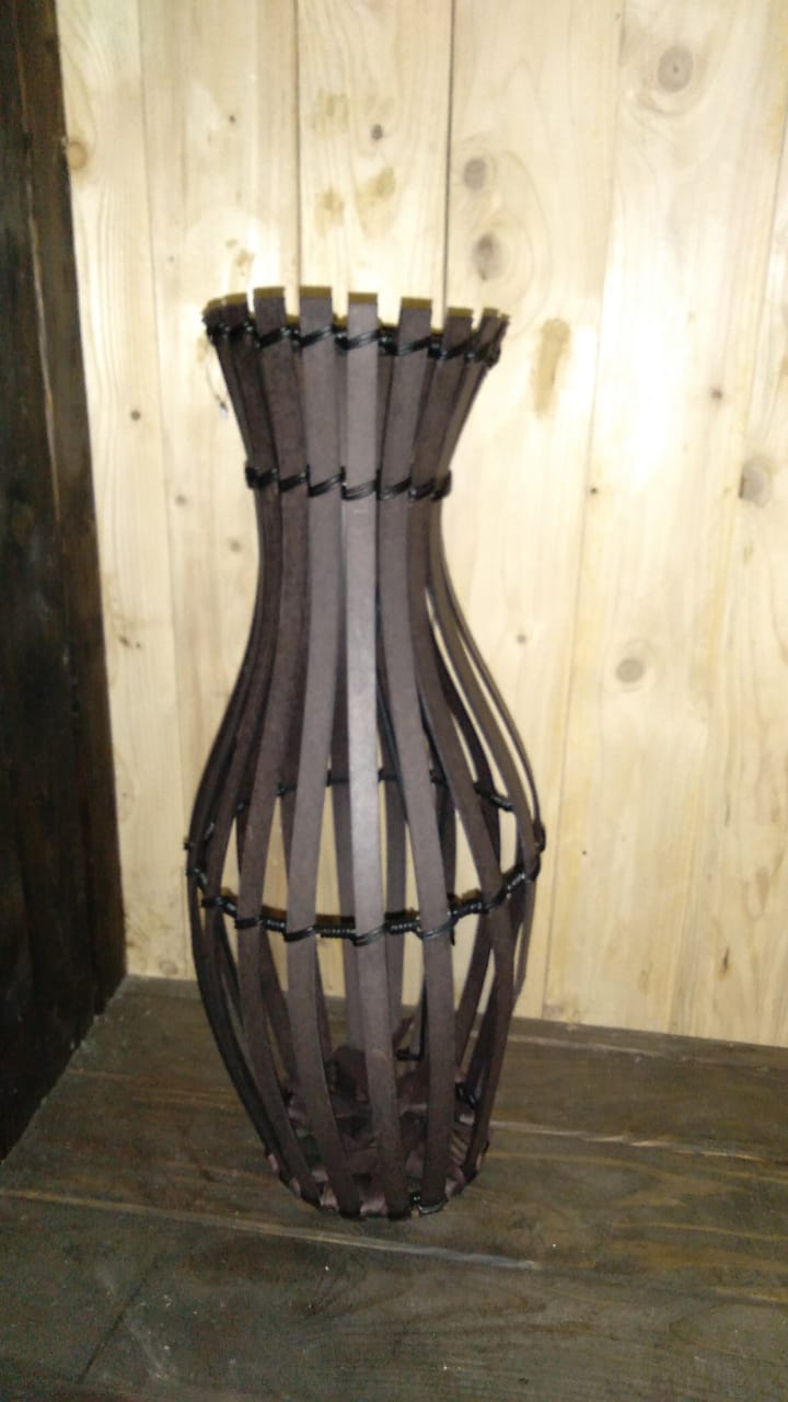 Slatted wooden vase in mahogany for displaying dried sticks, grass and flowers,