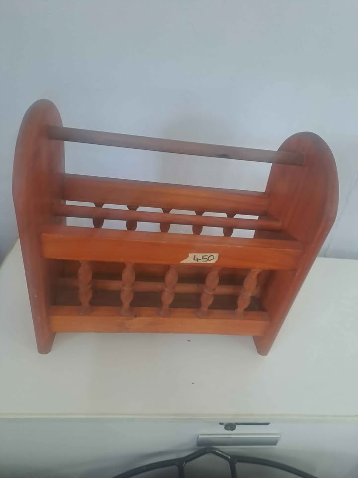 Vintage wooden magazine rack.