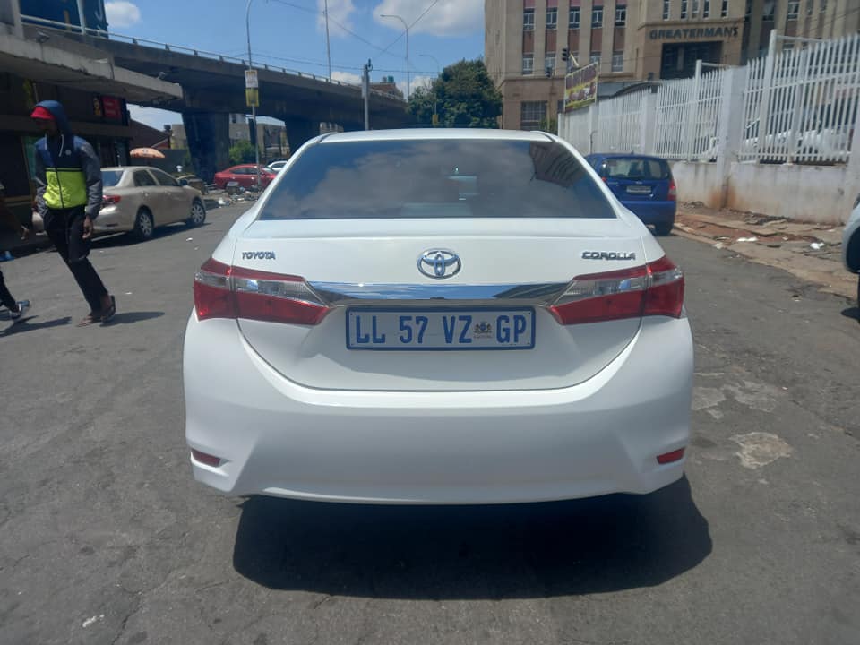 2015 TOYOTA COROLLA PRESTIGE 1.6 PETROL, MANUAL TRANSMISSION, WHITE COLOUR