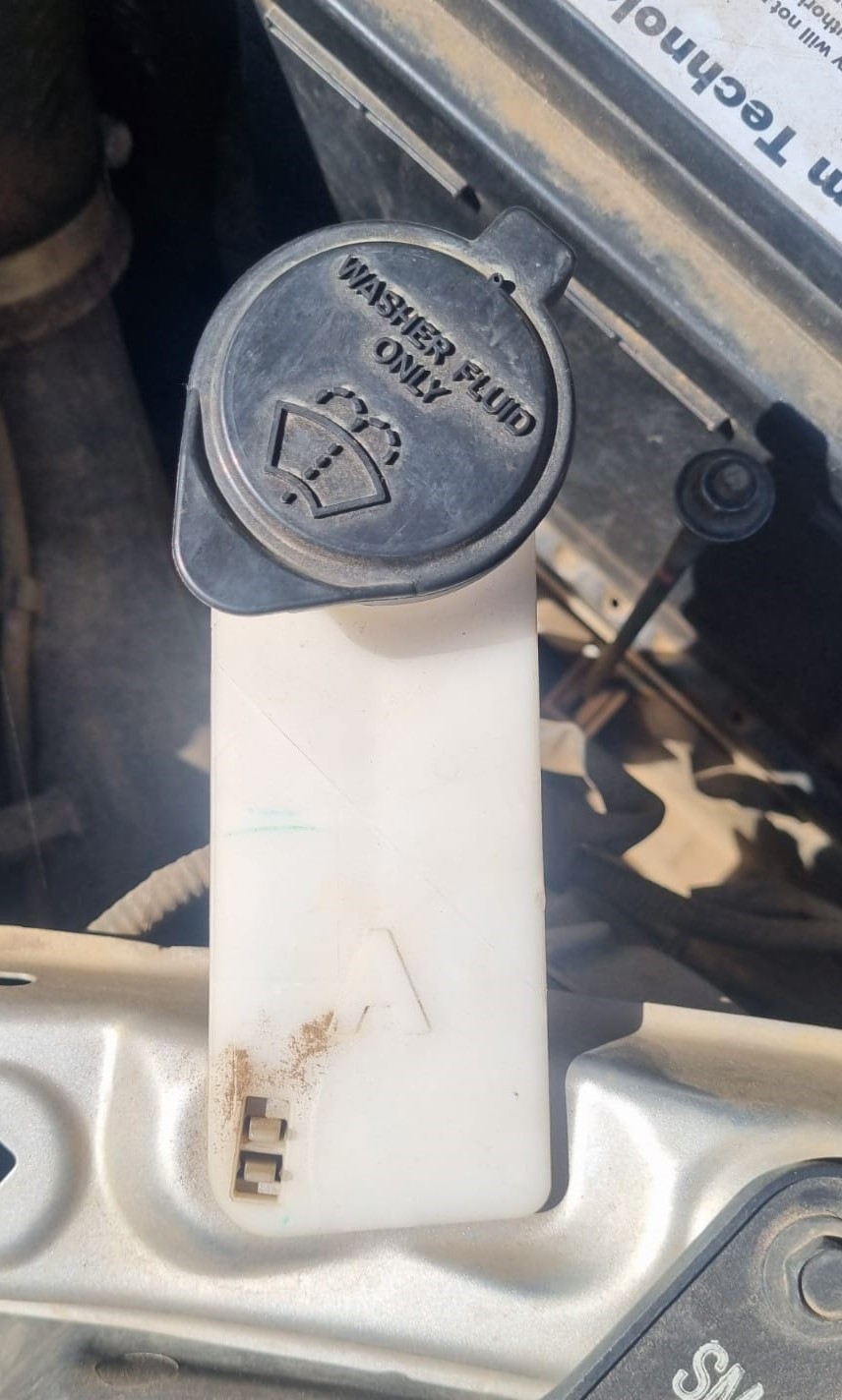 "Used Toyota Fortuner Wiper Fluid Bottle - Private Seller