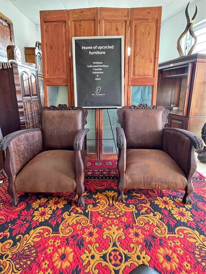 Antique Chairs – upholstered in brown buffalo leather ( price is per chair) Antique Chairs – upholstered in brown buffalo leather ( price is per chair)