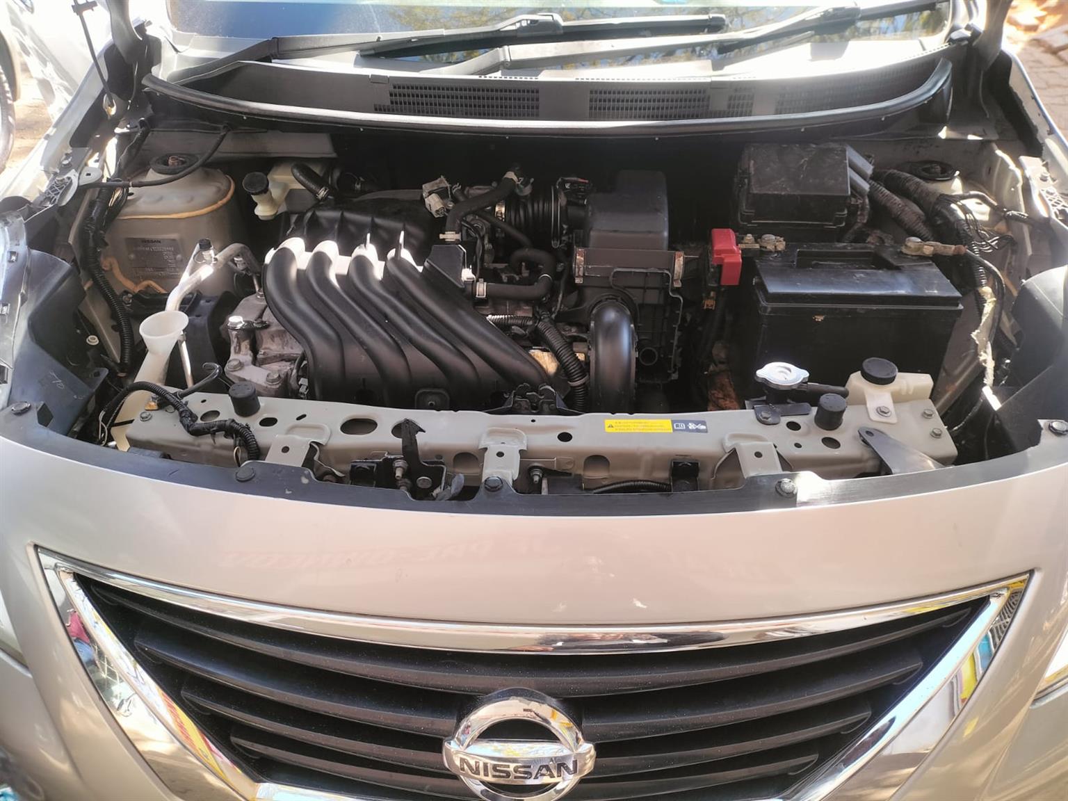 2015 Silver Nissan Almera sedan 1.5 Manual milage 86,000 km petrol