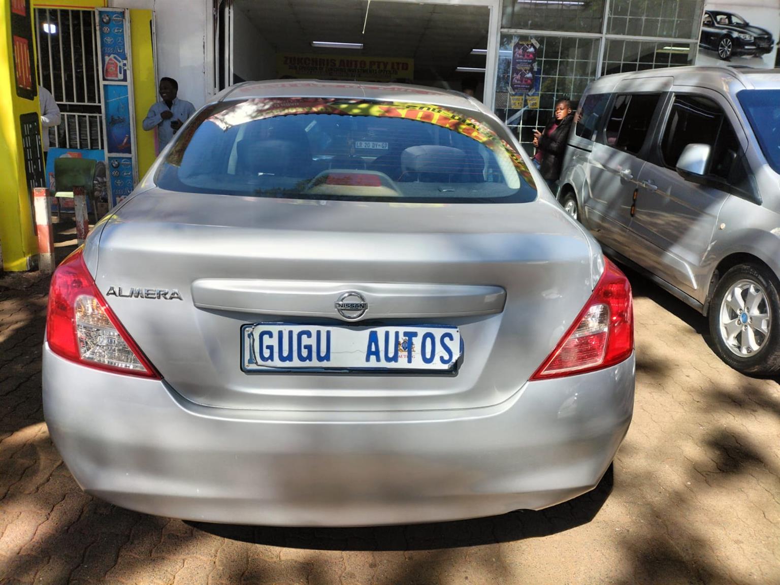 2015 Silver Nissan Almera sedan 1.5 Manual milage 86,000 km petrol