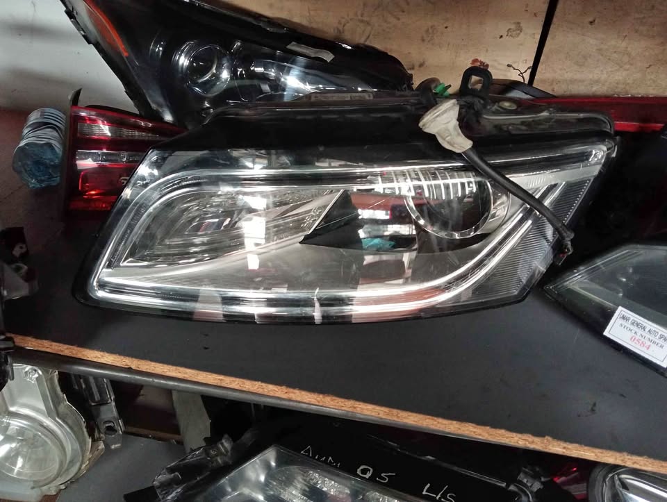 Audi Q5 Headlight  Used Auto Body Spare Parts at Sema Spare Center. Affordable - Private Seller