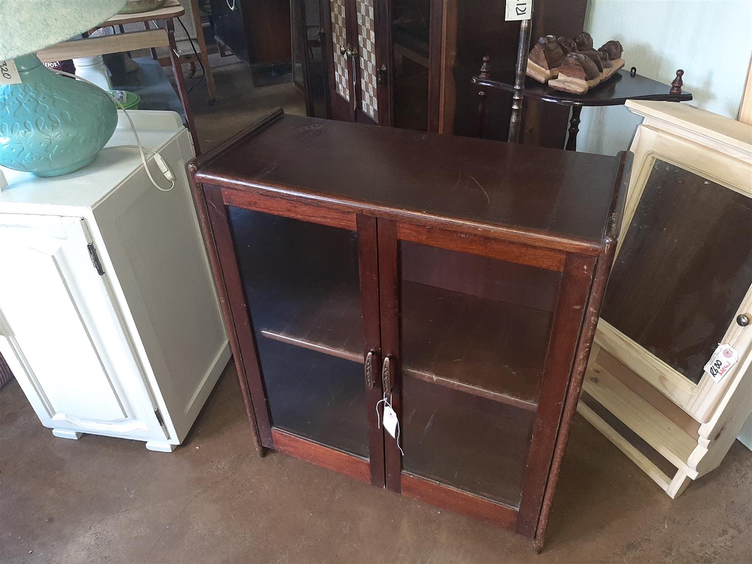 Small, glass-fronted bookcase or display cabinet