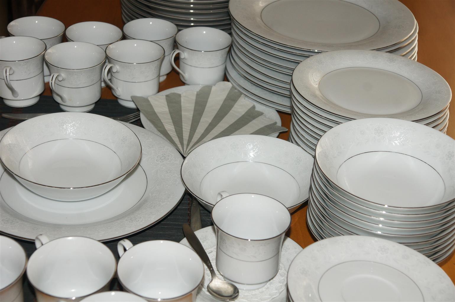 Elegantly beautiful Fine China 72 Piece Dinner Set in. Silver and White