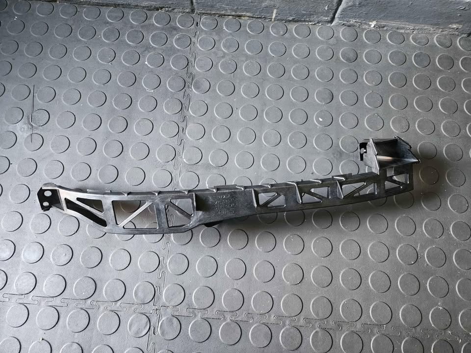 MAZDA 3 HEADLIGHT BRACKET - RHS