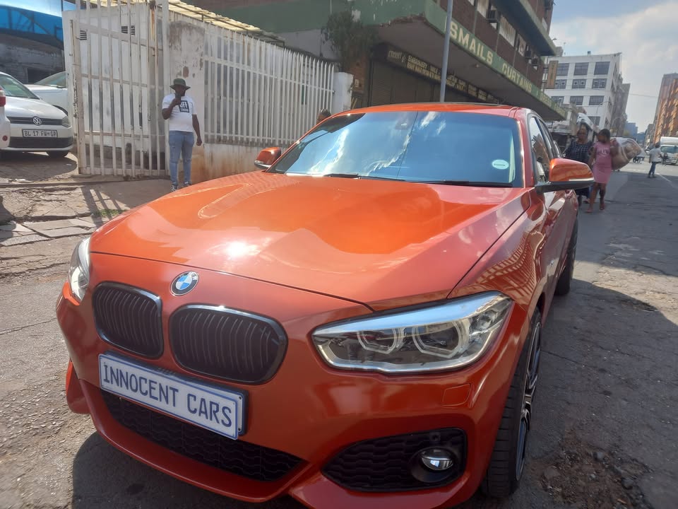 2017 BMW 120i MSPORT PETROL, AUTOMATIC TRANSMISSION, ORANGE COLOUR