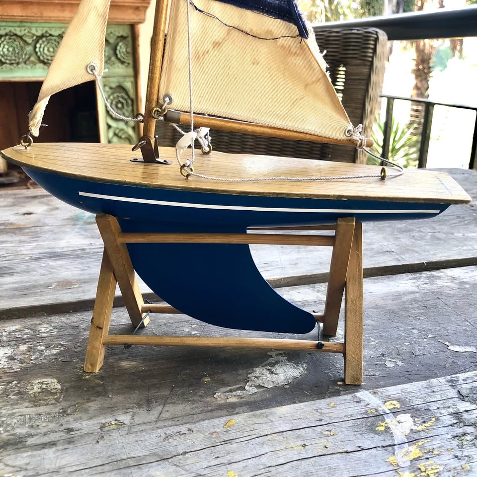 Vintage Decorative Sailing Boat on a wooden stand.