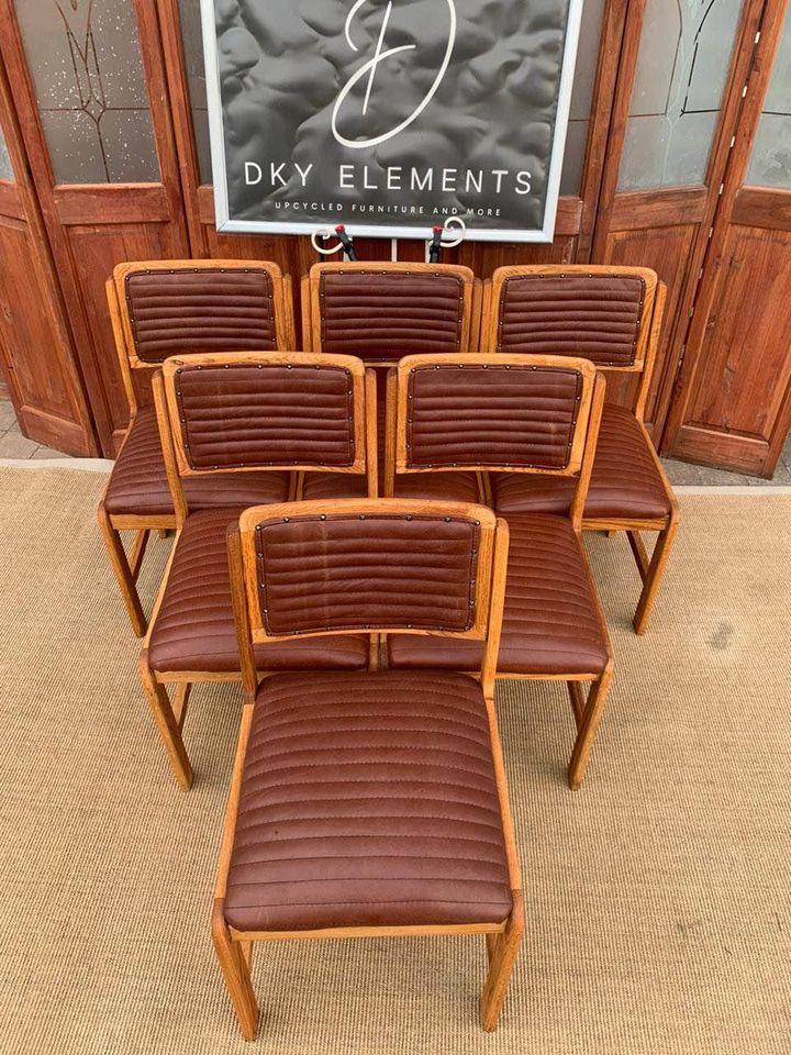 Leather couches, chairs, and other antique items