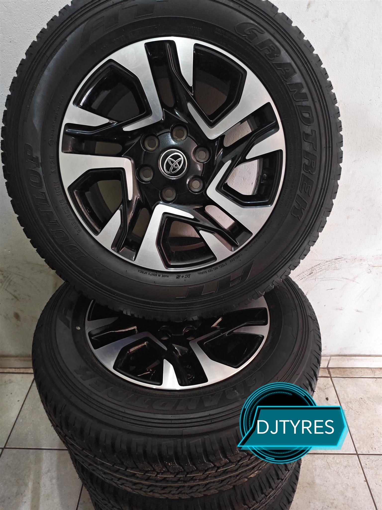 OEM Toyota Legend55 rims with dunlop grandtrek AT25 - Private Seller