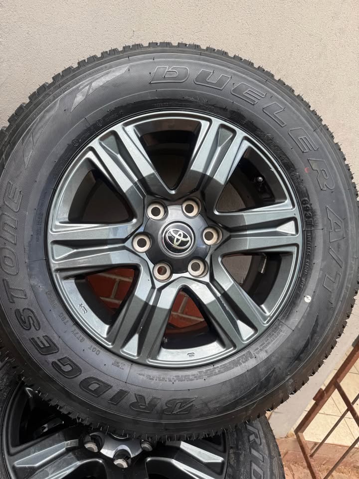 Toyota gd6 rims with 265/65R17 Bridgestone A/T - Private Seller