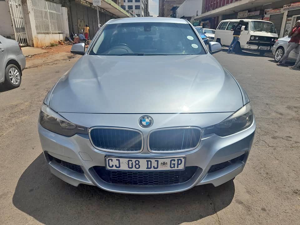 2013 BWM 3 series 320i Manual  Available Call Leon on