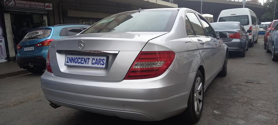 2012 MERCEDES BENZ C180 PETROL AUTOMATIC TRANSMISSION, SILVER COLOUR