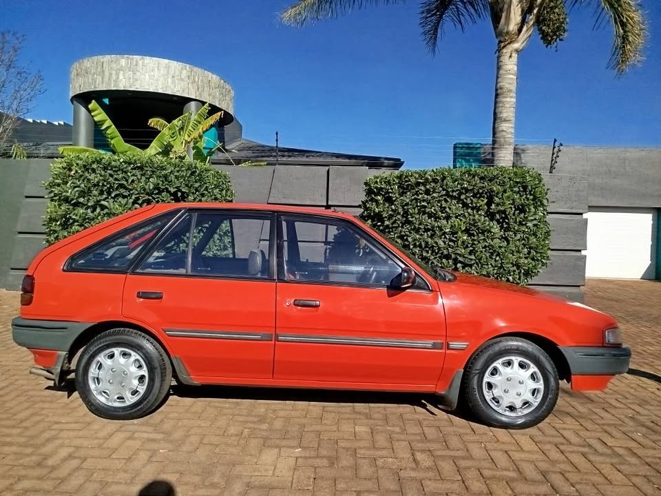 Call Haroon on 1992 Ford Laser original immaculate condition