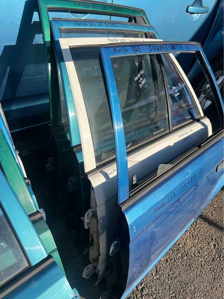 Mazda 323 Left Rear Doors For Sale Call or Whatsapp