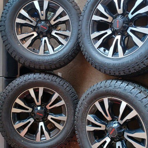 Isuzu rims and general grabber at3 tyres
