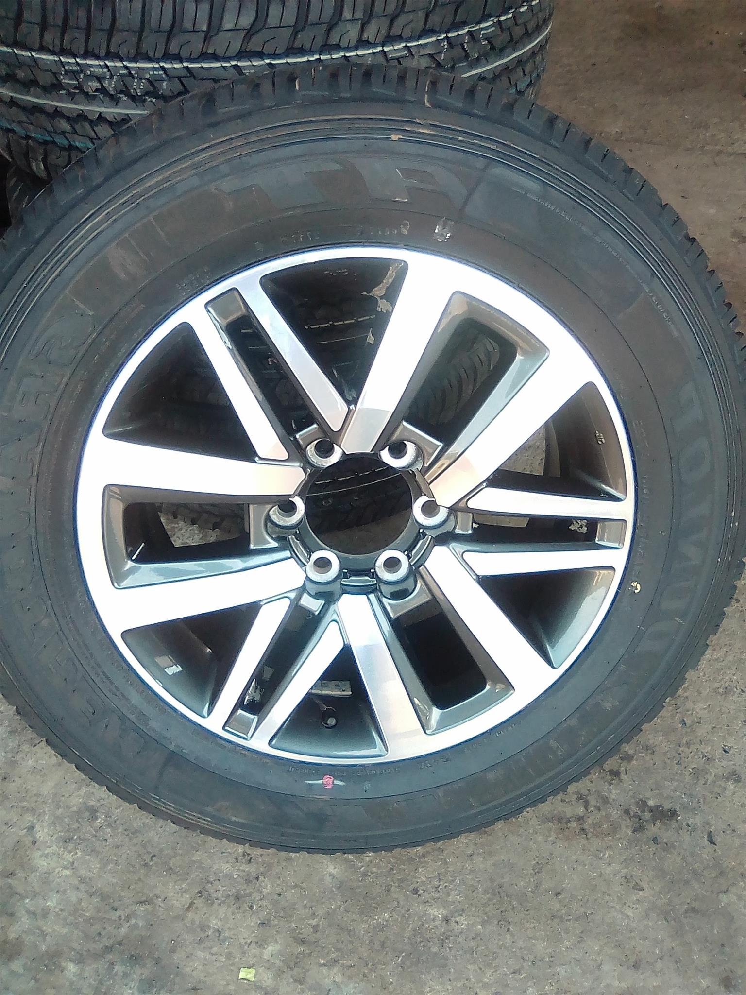Toyota Hilux/Fortuner 18inch original mag with brand new 265/60/18 Dunlop Grandt - Private Seller Toyota Hilux/Fortuner 18inch original mag with brand new 265/60/18 Dunlop Grandt - Private Seller