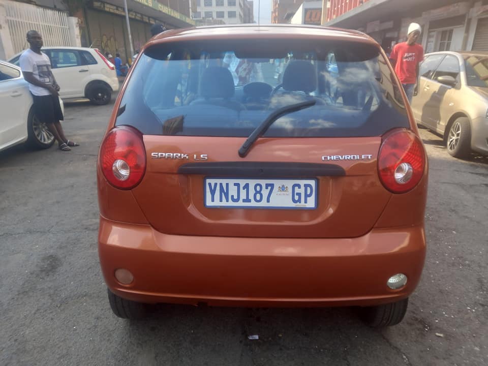 2009 CHEVROLET SPARK 1.1 PETROL, MANUAL TRANSMISSION, ORANGE COLOUR, MILEAGE