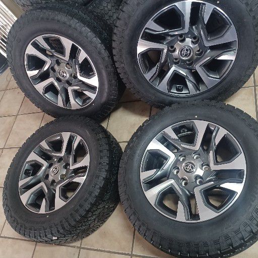 Toyota fortuna rims and general grabber at3