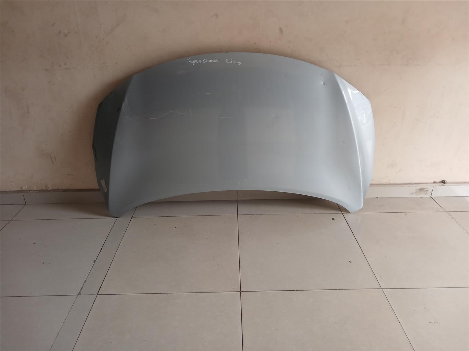 Suzuki baleno/Toyota starlet bonnet at Zuma spare parts durban - Private Seller