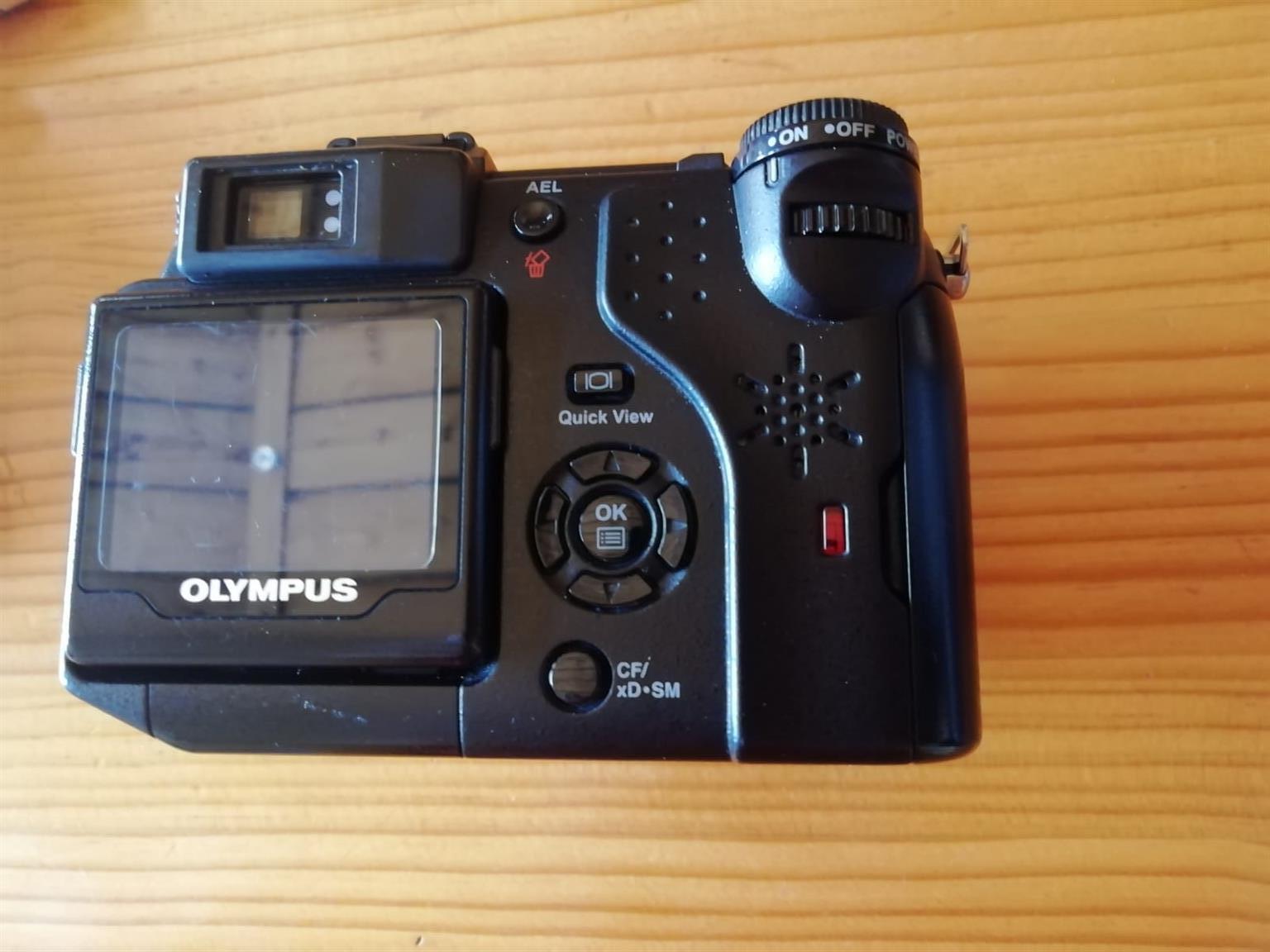 Olympus Camedia Digital Camera C5050 5 MP = Battery Cover doesn't work/close