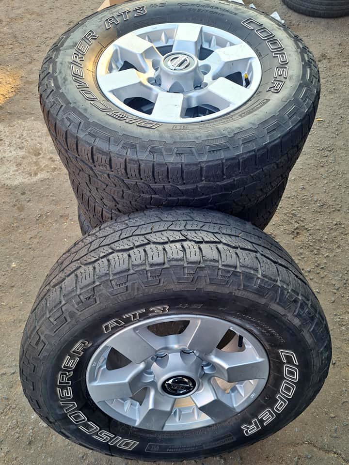 Nissan np300 original alloy mags size 16×tyres 265/80/16 Cooper - Private Seller