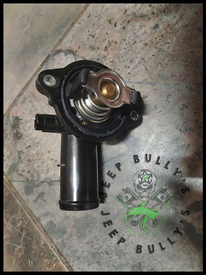 Jeep Thermostat and Housing Assembly: Kalahari Jeep Spares - Private Seller Jeep Thermostat and Housing Assembly: Kalahari Jeep Spares - Private Seller