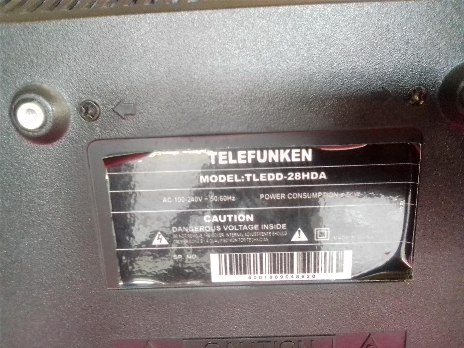 A TELEFUNKEN 28"LED TV with a broken screen.