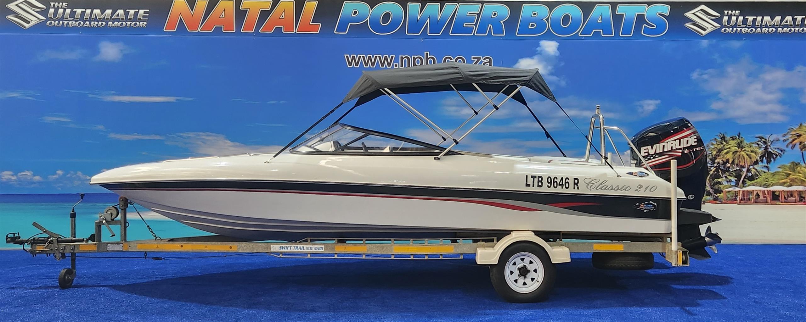 CLASSIC 210 ON TRAILER 200 HP EVINRUDE ETEC