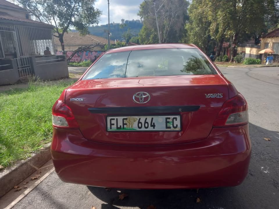 2009 Toyota Yaris Sedan Maroon, Zen3 Petrol, Manual
