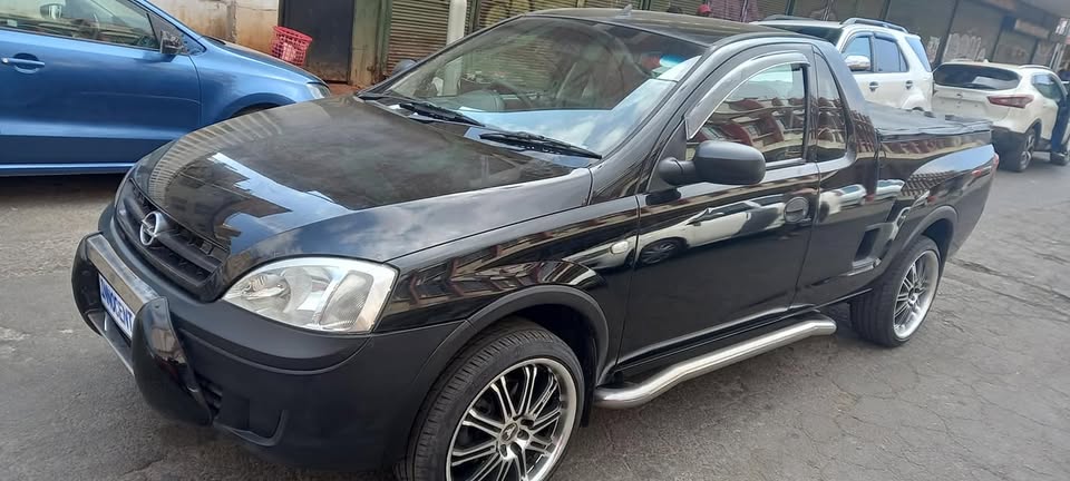 2011 OPEL CORSA BAKKIE 1.4 MANUAL TRANSMISSION, BLACK COLOUR 96000KM
