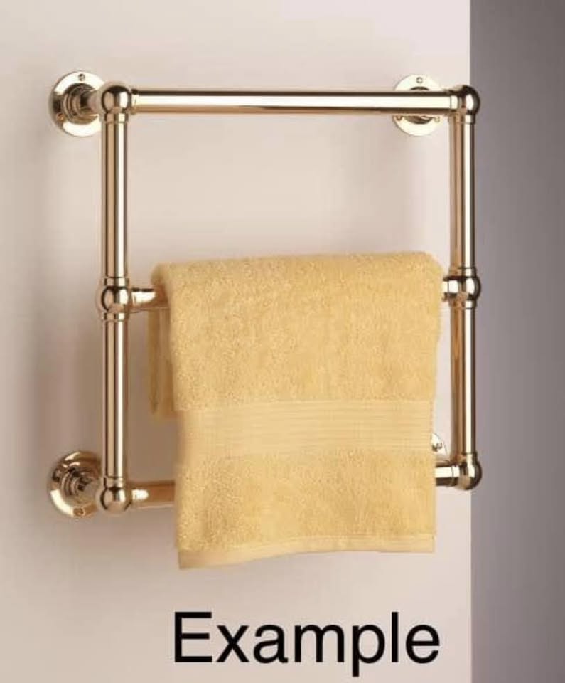 - Antique brass towel heating rail - (might need new wiring).