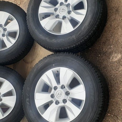 fairly used Toyota rims and tyres