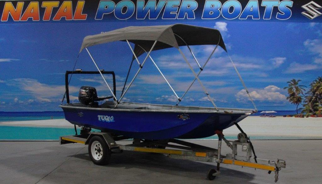 TUG 20 ON TRAILER 15 HP SUZUKI 4 STROKE TILLER
