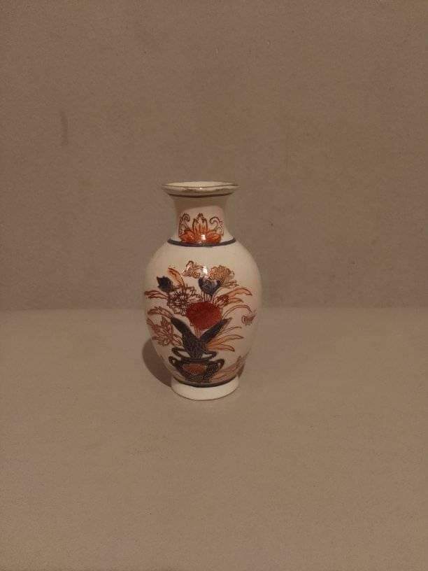 A vintage Japanese hand painted vase