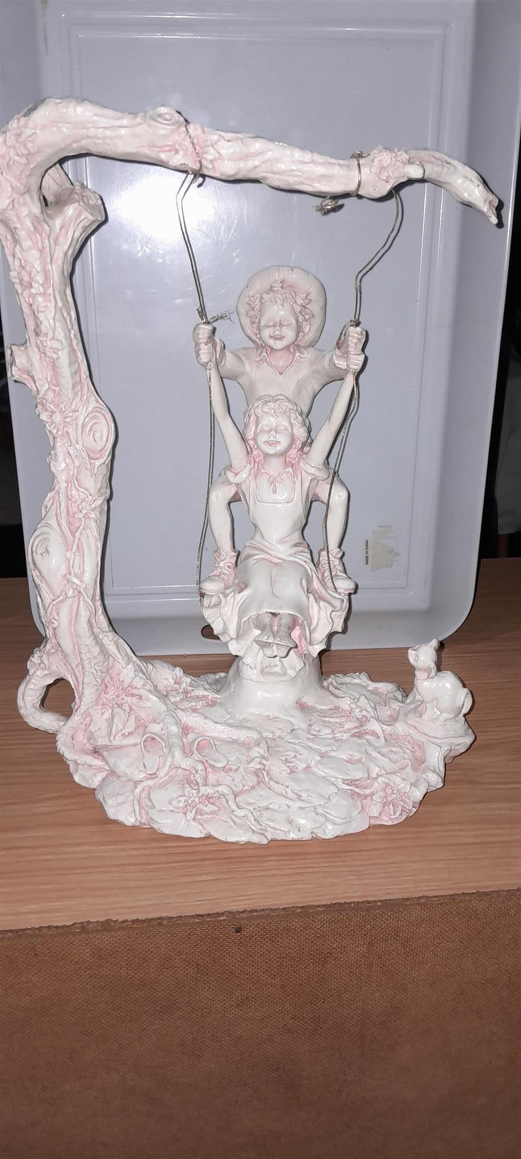 Giuseppe Armani The swing statue