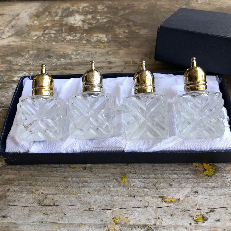A lovely vintage set of 4 Viking Glass Salt and pepper set -Still in original box.