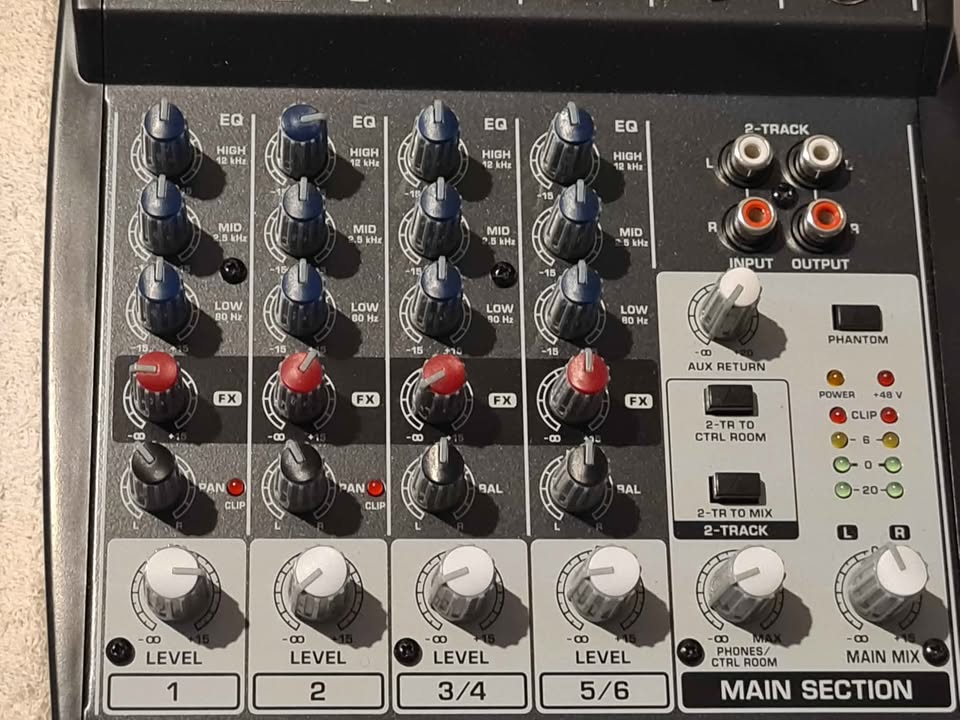 Behringer Xenyx 802 audio mixer.
