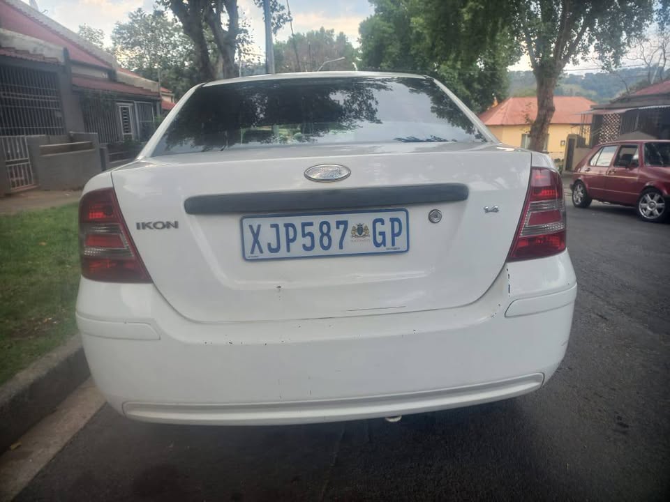 Ford Ikon Sedan 2009 Model 1.4 Engine Petrol, Manual Transmission, White Color, Mileage