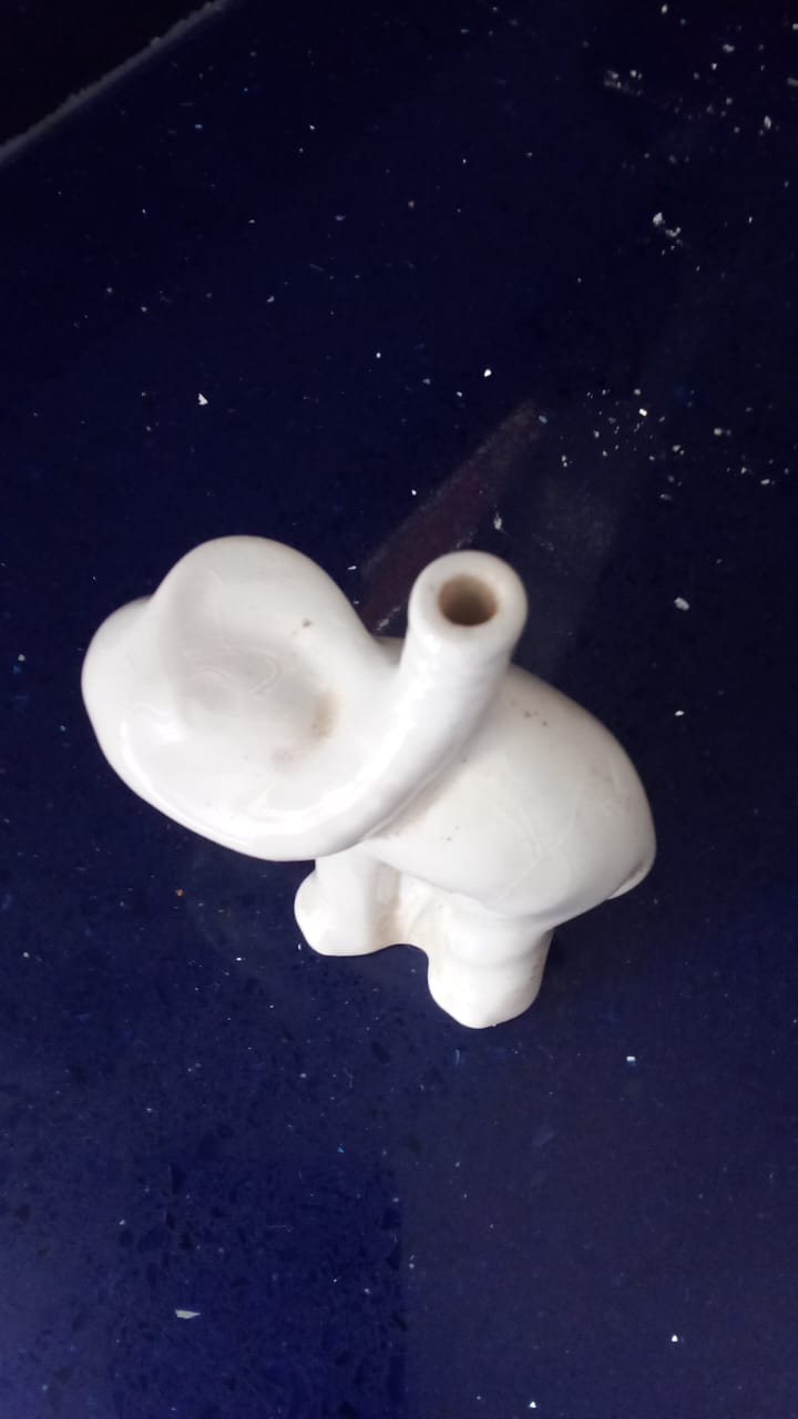 Antique elephant pie funnel