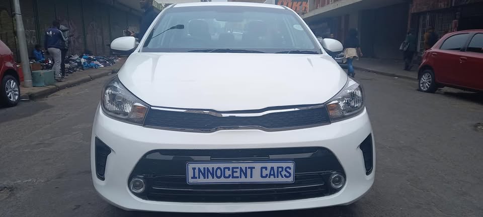 USED 2022 KIA PEGAS SEDAN 1.4 PETROL, MANUAL, WHITE COLOUR, MILEAGE 57000KM