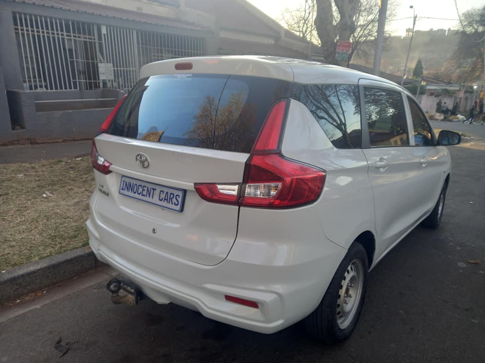 2023 TOYOTA RUMION 1.5 ENGINE PETROL, 7SEATER, MANUAL, WHITE COLOR, MILEAGE 50000KMS