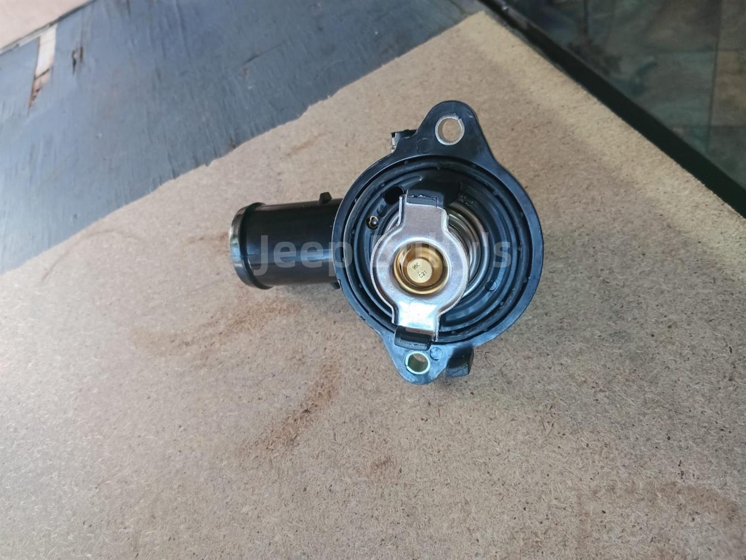 Brand New (Plastic) 3.6 Thermostat - Jeep Spares - Private Seller Brand New (Plastic) 3.6 Thermostat - Jeep Spares - Private Seller