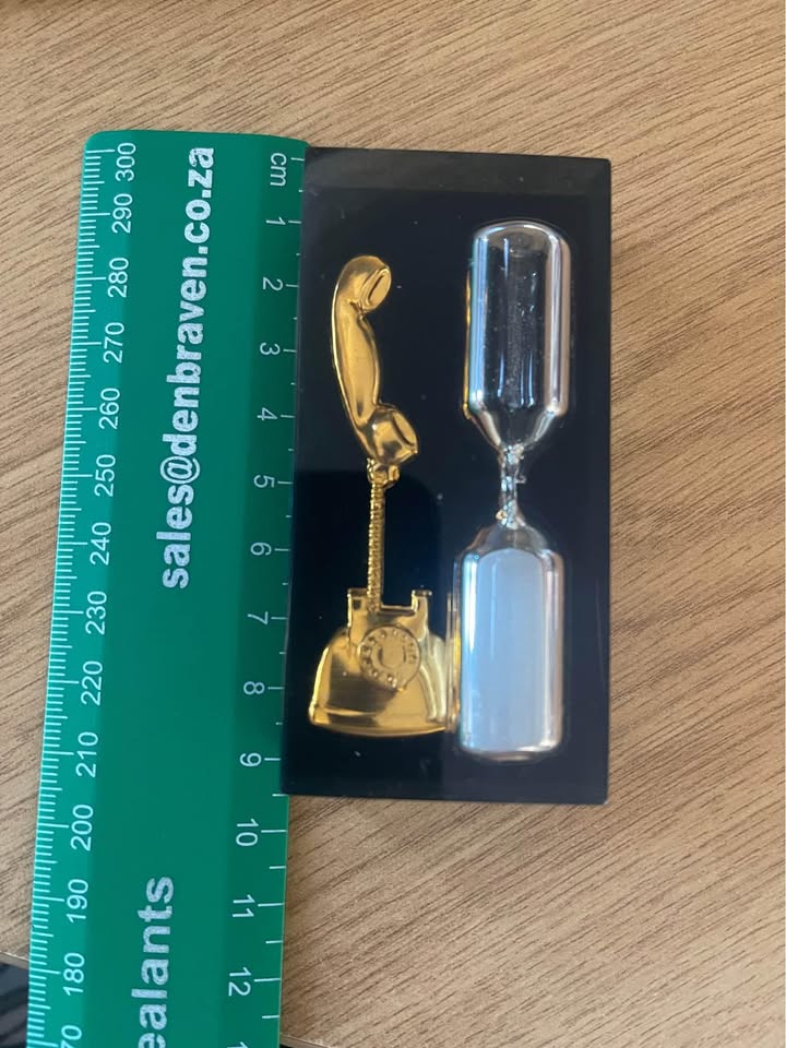 Vintage gold tone sand telephone timer