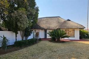 Character-Filled 3-Bedroom Thatch Home on Corner Stand  with 3 Double Automated Garages in Randhart