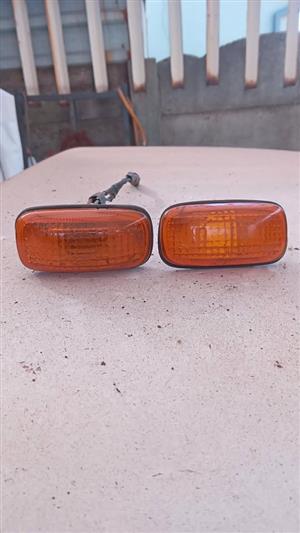 2000 Nissan 1400 champ fender indicators, Original no cracks. Cell: , East Rand. 1400 Champ.