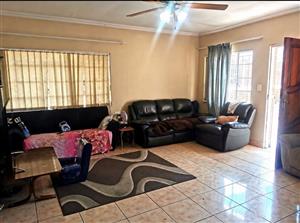 Spacious Family Home with Income-Generating Flatlets in Primrose